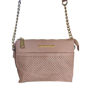 Steve Madden laser cut faux-leather crossbody shoulder bag.